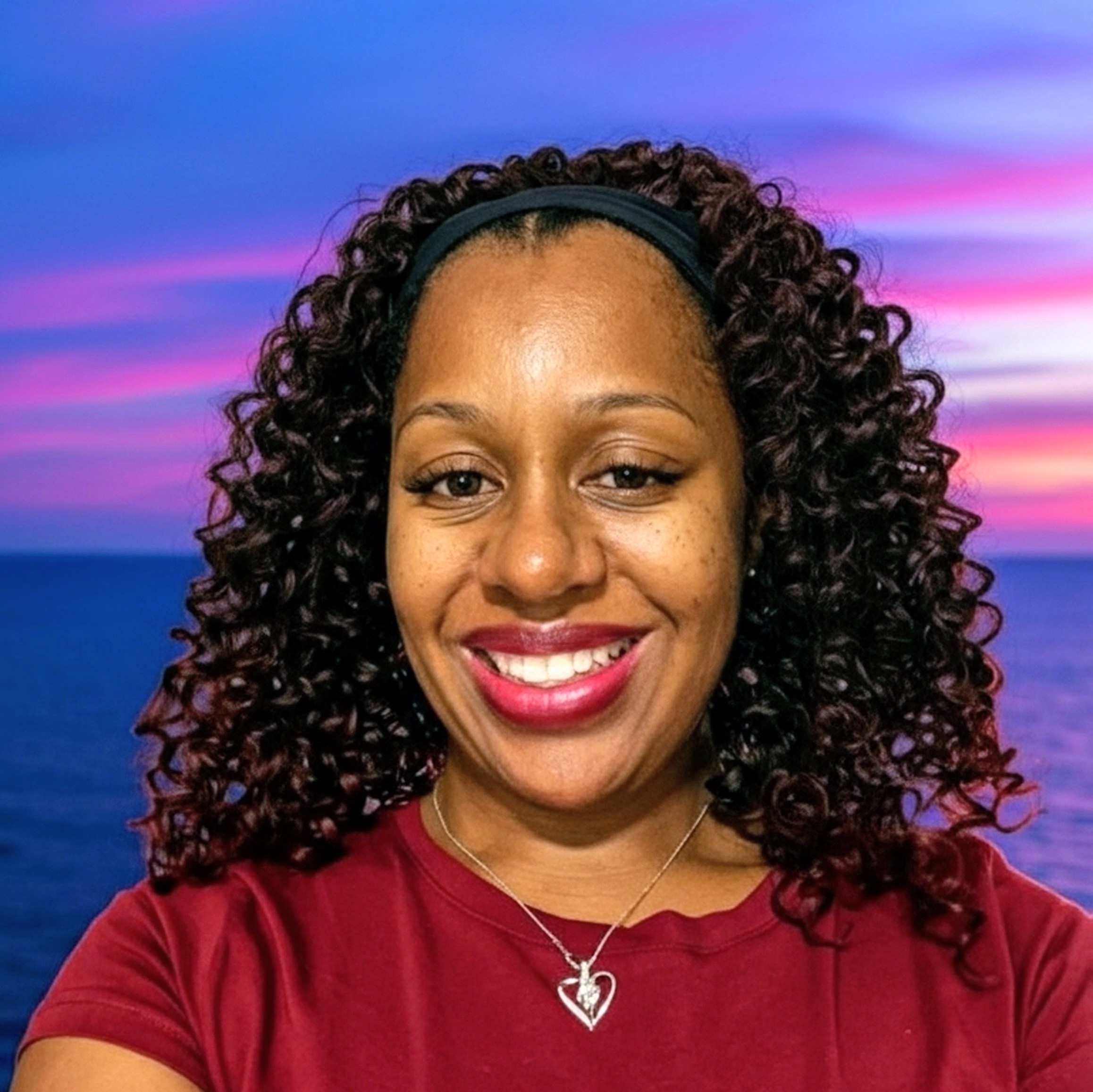 Tamara G. Hall smiling, professional headshot