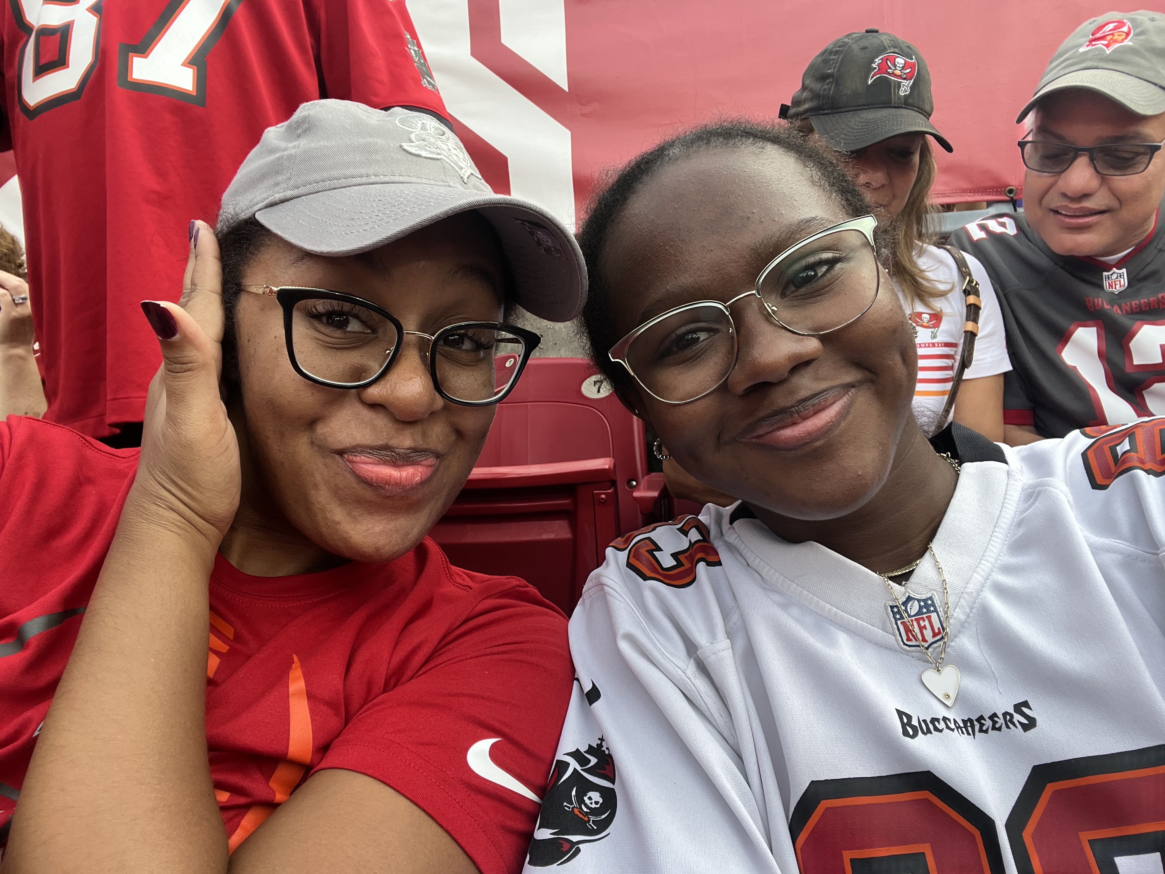 Tamara and a friend at a Tampa Bay Buccaneers game